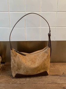 Vintage brown suede underarm bag with leather trim and adjustable shoulder strap