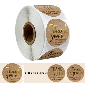 Roll of 1 inch gold foil Thank You stickers on kraft paper for small business packaging