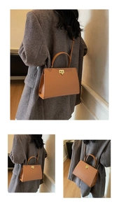 Détail du sac cabas caramel en similicuir avec fermoir doré et bandoulière amovible