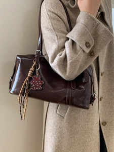 Retro deep brown oil wax leather pillow bag with bear charm and woven keychain
