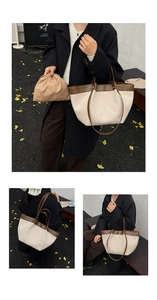 Detail of canvas tote bag with brown leather trim and matching drawstring inner pouch