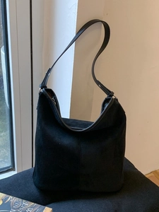 Retro black suede hobo shoulder bag with minimalist leather strap and silver hardware