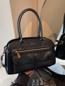 Black vintage leather boston bag with multi-pocket design and adjustable shoulder strap