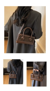 Detail of vintage leopard print patchwork handbag with smooth leather and round buttons