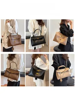 Detail view of large faux leather tote bag showing crossbody, shoulder and handbag styles