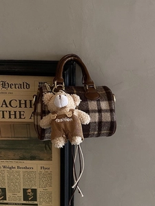 Retro plaid Boston barrel handbag with brown leather straps and cute plush bear charm