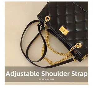 Detail of adjustable leather strap and gold chain on quilted rhombus tote bag