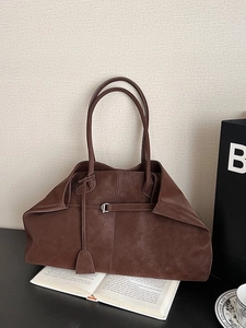 Minimalist brown suede tote bag with dual shoulder straps for daily commuting