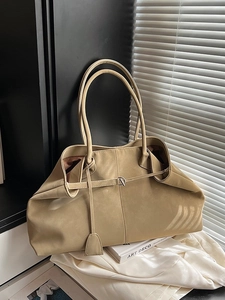 Large khaki leather tote bag with long shoulder straps and metal buckle decoration