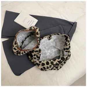 Leopard print plush tote bag set with matching zippered clutch and magnetic closure