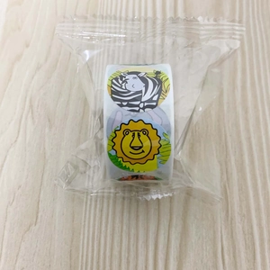 Detail of colorful roll-up animal stickers for children featuring lion and zebra motifs