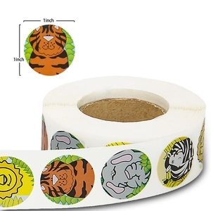 Roll of 1 inch round cartoon animal stickers featuring tiger and zebra patterns