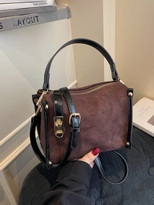 Vintage dark brown quilted suede tote bag with black handles and golden twist lock