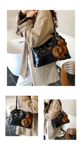 Détail du cabas en cuir verni noir brillant avec breloque cœur et pendentif ours