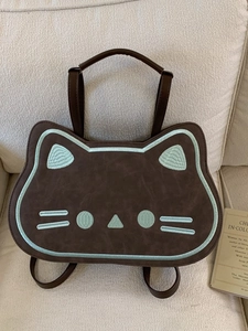Cute brown cat-shaped backpack for women featuring embroidered details and large capacity