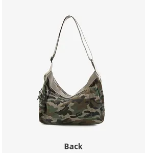 Detailed back view of a camouflage canvas hobo bag with adjustable strap and metal buckle