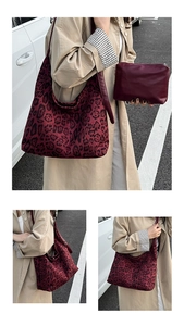 Detail of burgundy leopard print tote bag and matching pouch with soft fabric texture