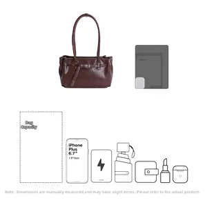 Brown leather tote bag detail showing large capacity for phone, wallet, and essentials