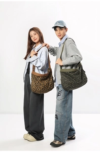 Detail of leopard print canvas crossbody bags in brown and olive for daily commute
