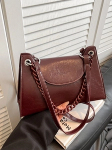 Vintage dark red chain crossbody bag for women with leather strap and classic flap design