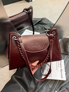 Retro burgundy chain crossbody bag for women with glossy leather finish and sleek flap