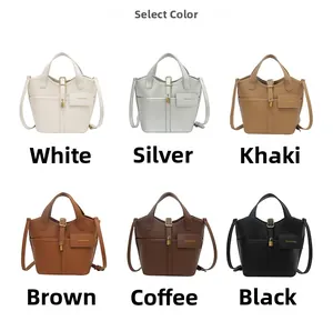 Detail view of bucket bags in six colors with pebble grain texture and fashion tags