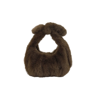 Soft faux fur cloud bag in dark brown with vertical quilting and knotted handle