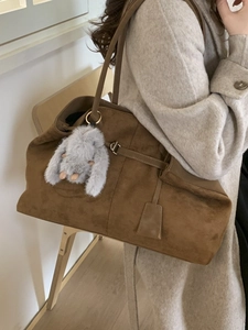 Minimalist dark brown suede tote bag for women with plush rabbit charm and shoulder strap