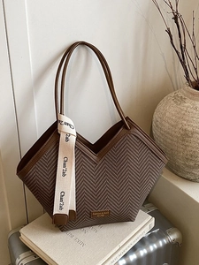 Retro large capacity tote bag in dark brown with textured patterns and V-cut top handles