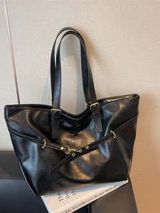 Classic black vintage faux leather tote bag with gold metal buckle for daily commute