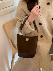 Vintage brown suede bucket bag with leather patchwork and gold fashion metal hardware