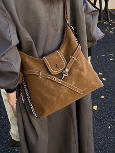 Brown suede large capacity crossbody bag with silver rings and buckle detail