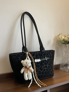 Vintage black leopard faux suede tote bag with belt detail and plush bear charm