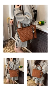 Close-up of brown woven tote bag featuring colorful bead tassel and adjustable strap