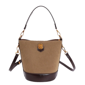 Retro brown suede bucket bag with top handle and adjustable shoulder strap for women