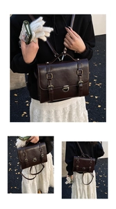Dettaglio borsa vintage marrone scuro con fibbia in metallo e diverse opzioni di trasporto