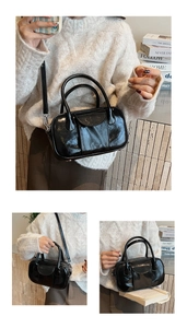 Detailed views of a black oil wax leather bowling bag with twin handles and crossbody strap