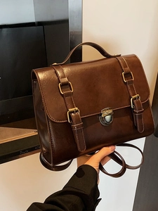 Borsa a tracolla retrò marrone scuro con fibbia e trama in pelle vintage