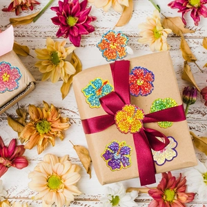 Colorful hibiscus flower stickers roll for decorative gift packaging and DIY crafts