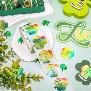 Holographic St. Patrick's Day clover stickers with Lucky text on a 500-label roll