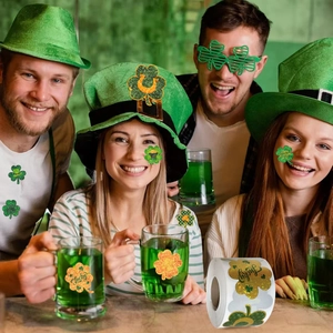 Roll of St. Patrick's Day shamrock stickers with Lucky and Happy St. Patrick's Day text