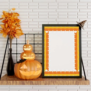 Halloween bulletin board border with candy corn pattern on a wooden shelf with pumpkin décor