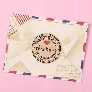 Kraft paper thank you stickers with heart detail for handmade gift sealing and packaging