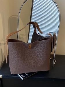 Brown leopard print suede tote bag with golden square lock and minimalist shoulder straps