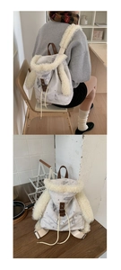 Detail of plush rabbit ear backpack in light grey with cream fleece trim and drawstrings