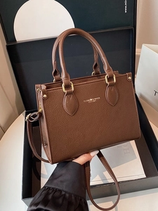 Brown lychee leather handbag with gold hardware and removable shoulder strap for women
