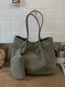 Minimalist grey-green tote bag with litchi texture and matching small pouch