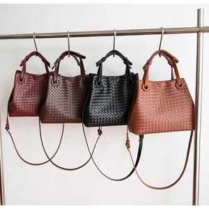 Detail showing hand-woven textures and colors of stylish crossbody hobo bags