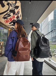 Waterproof PU leather fashion backpack with large capacity for students and commuting