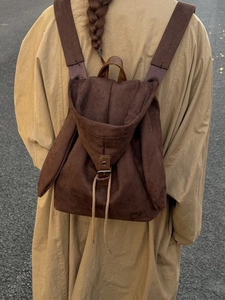 Minimalist dark brown faux suede backpack with hood and rabbit ears in casual style
